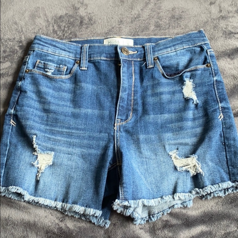 ripped blue jean shorts